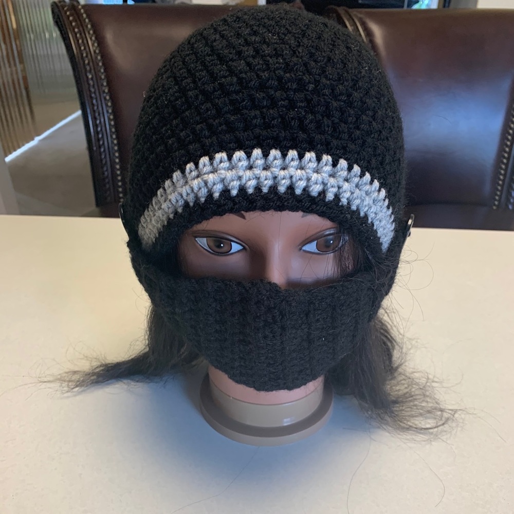 Hand made crochet hat with removable mask.